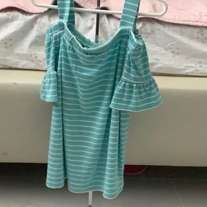Light blue white striped shirt.